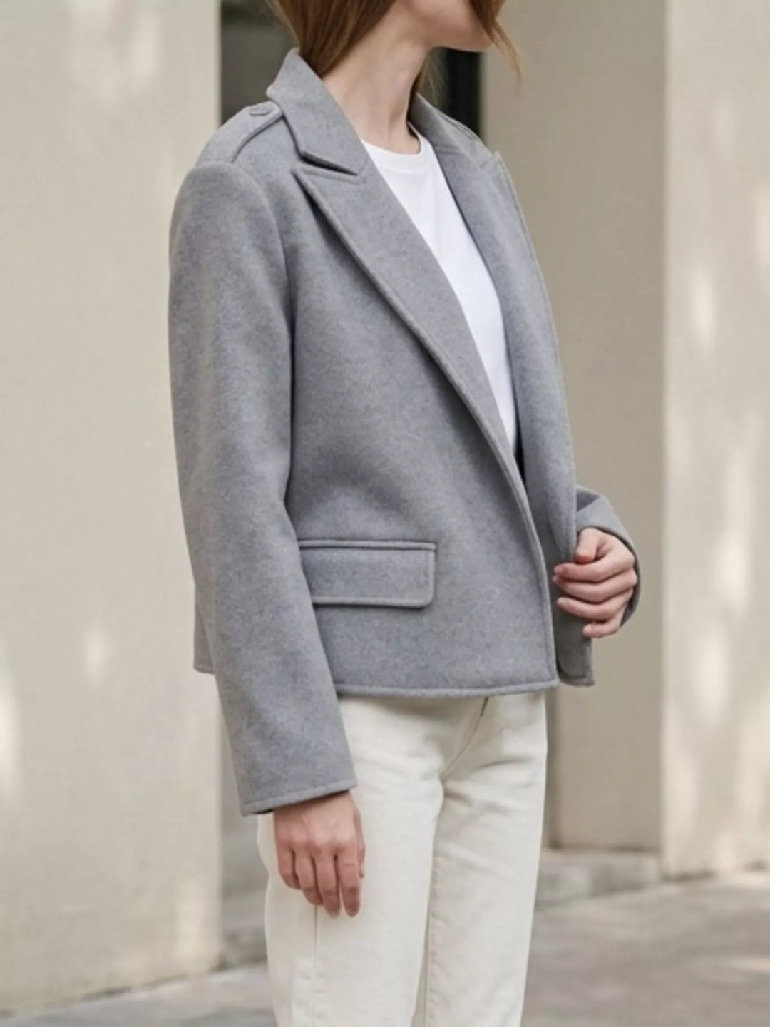 Notch lapel cropped jacket with epaulettes and flap pockets