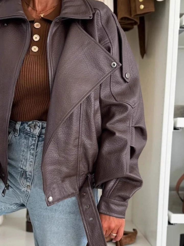 Oversized faux leather moto jacket with belted hem