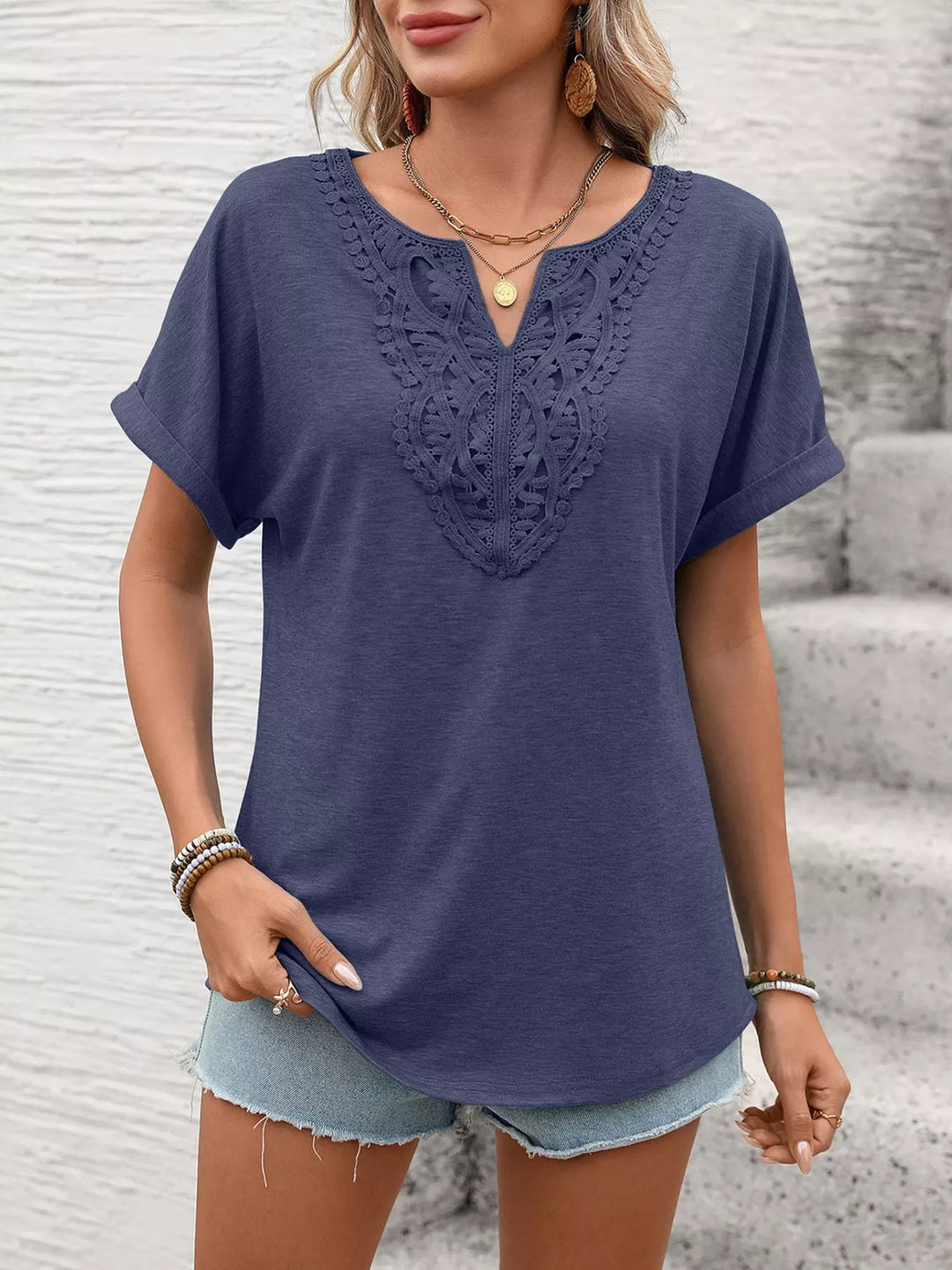 Lace-trim V-neck short sleeve top with rolled cuffs