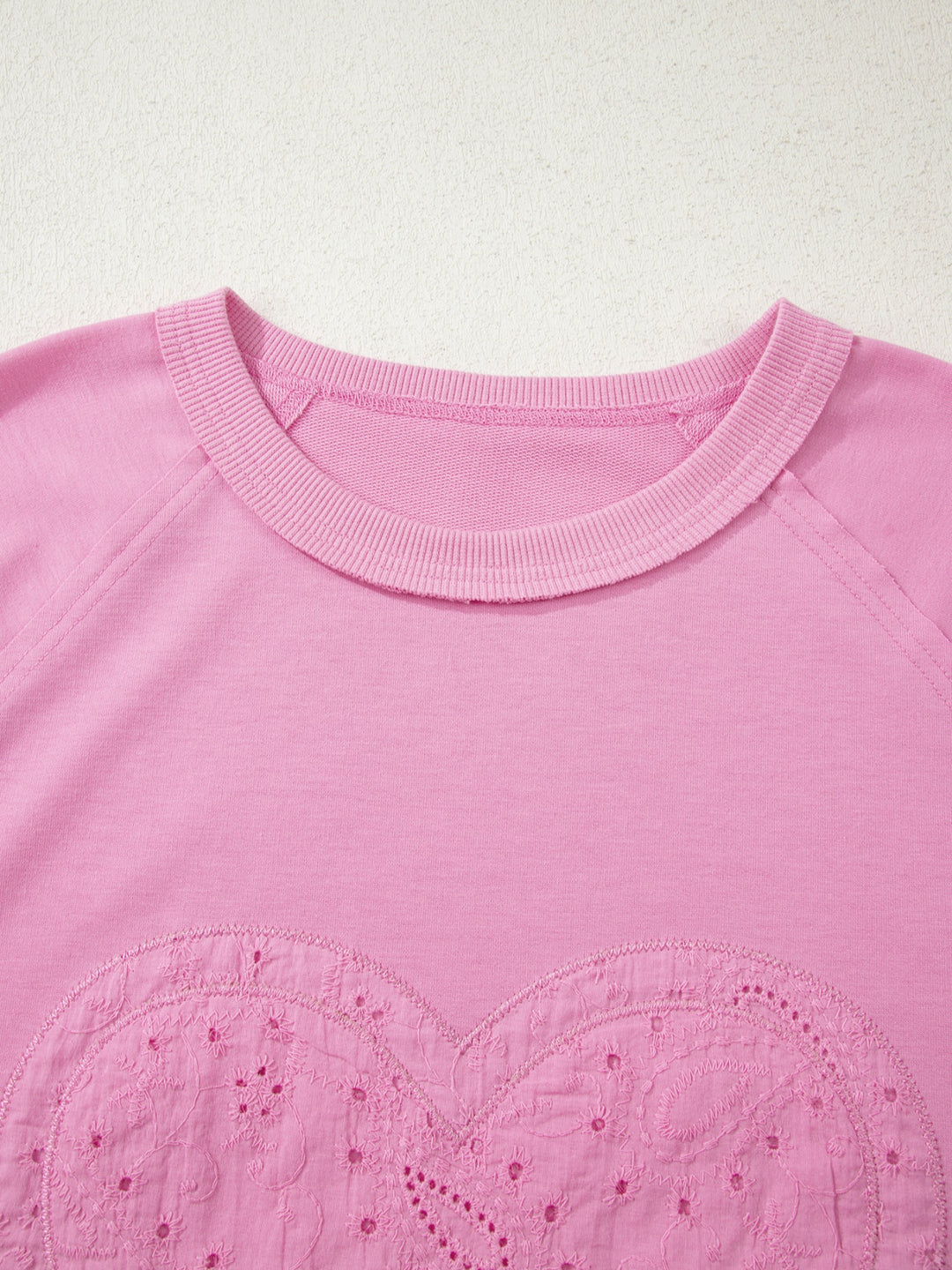 Eyelet lace heart patch long sleeve pullover top