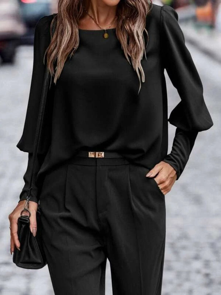 Black Lantern sleeve round neck blouse with puff shoulders
