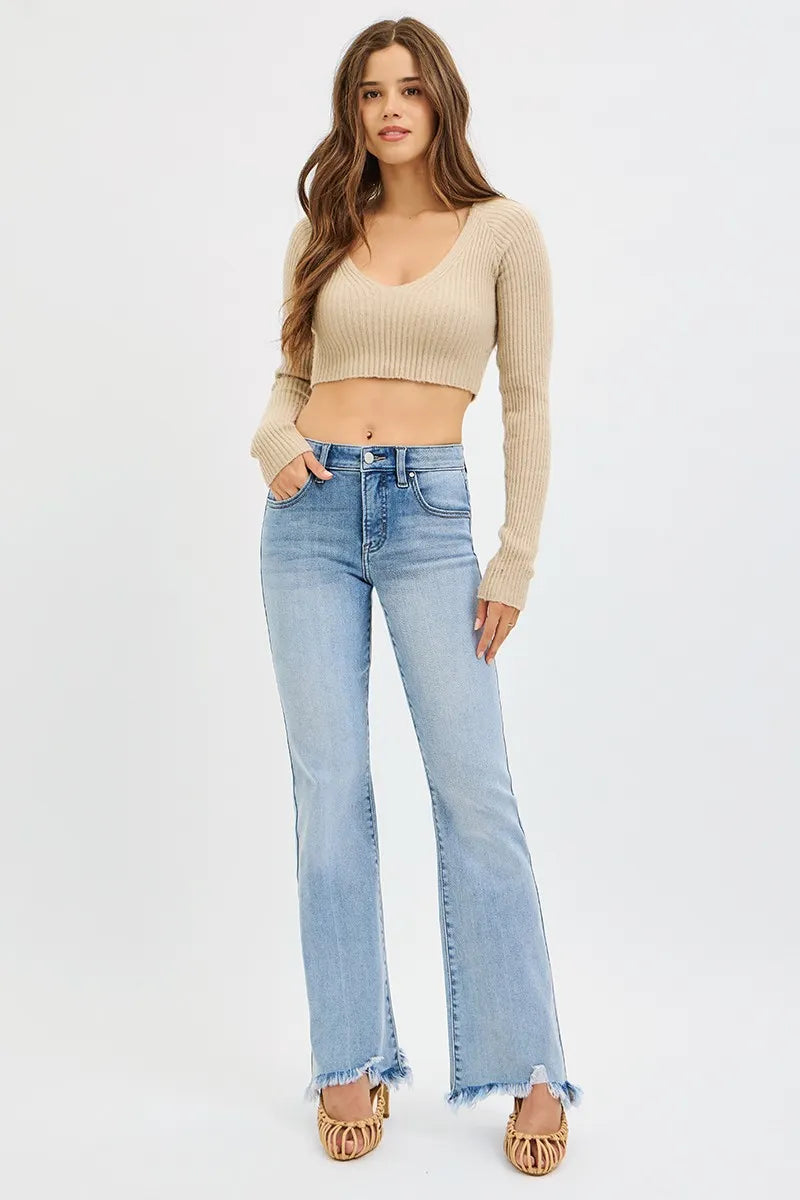 Mid-rise flare jeans with frayed raw hem and tummy control
