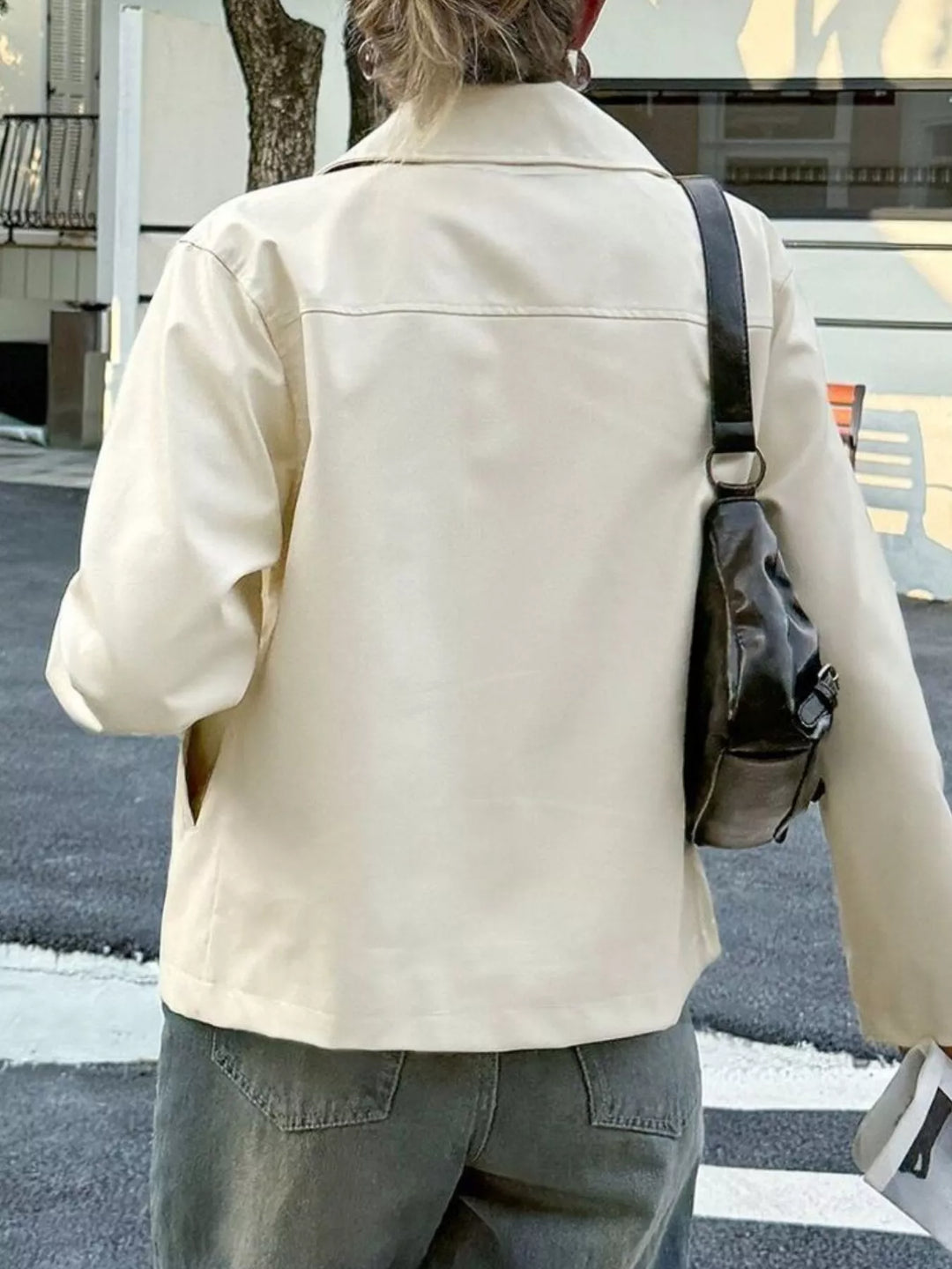Collared faux leather zip-up jacket with patch pockets