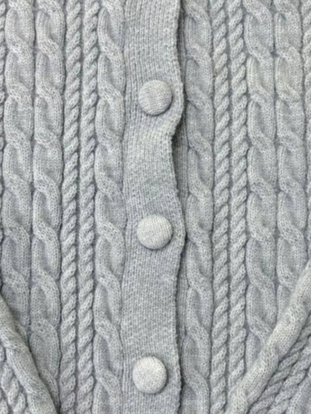 Cropped cable knit button-up cardigan with ribbed cuffs