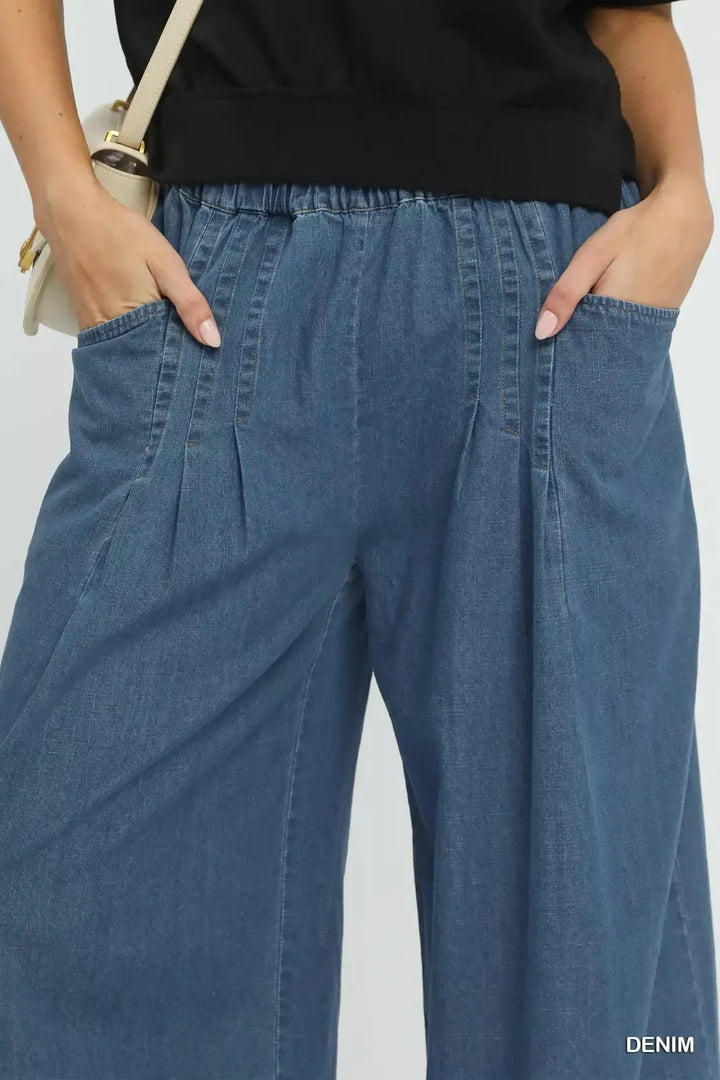 Stone washed wide leg cotton pants with raw hem