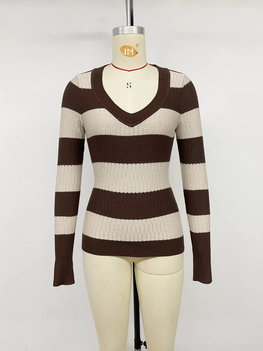 Striped cable knit v-neck pullover with ribbed trim