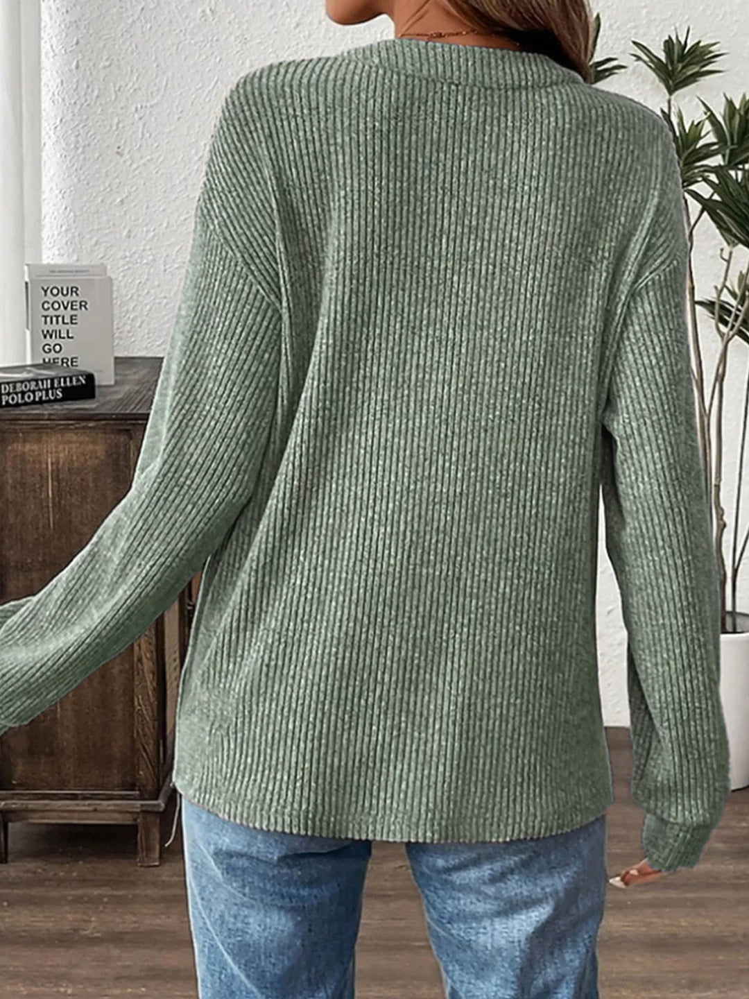 Ribbed knit long sleeve henley top with button placket