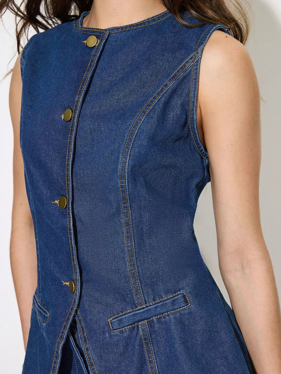 Sleeveless button-up denim top with welt pockets