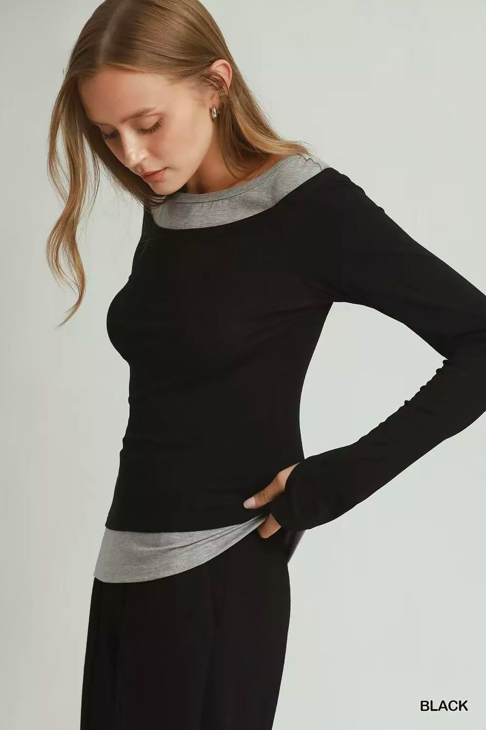 Twofer layered long sleeve top with contrast trim and thumbholes