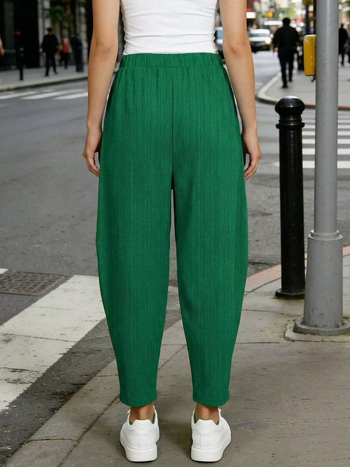 Plus size elastic waist harem pants with side pockets