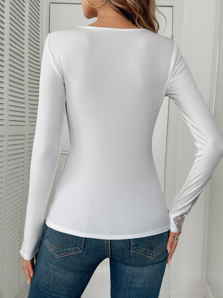 Ribbed knit top with floral lace trim and rhinestones