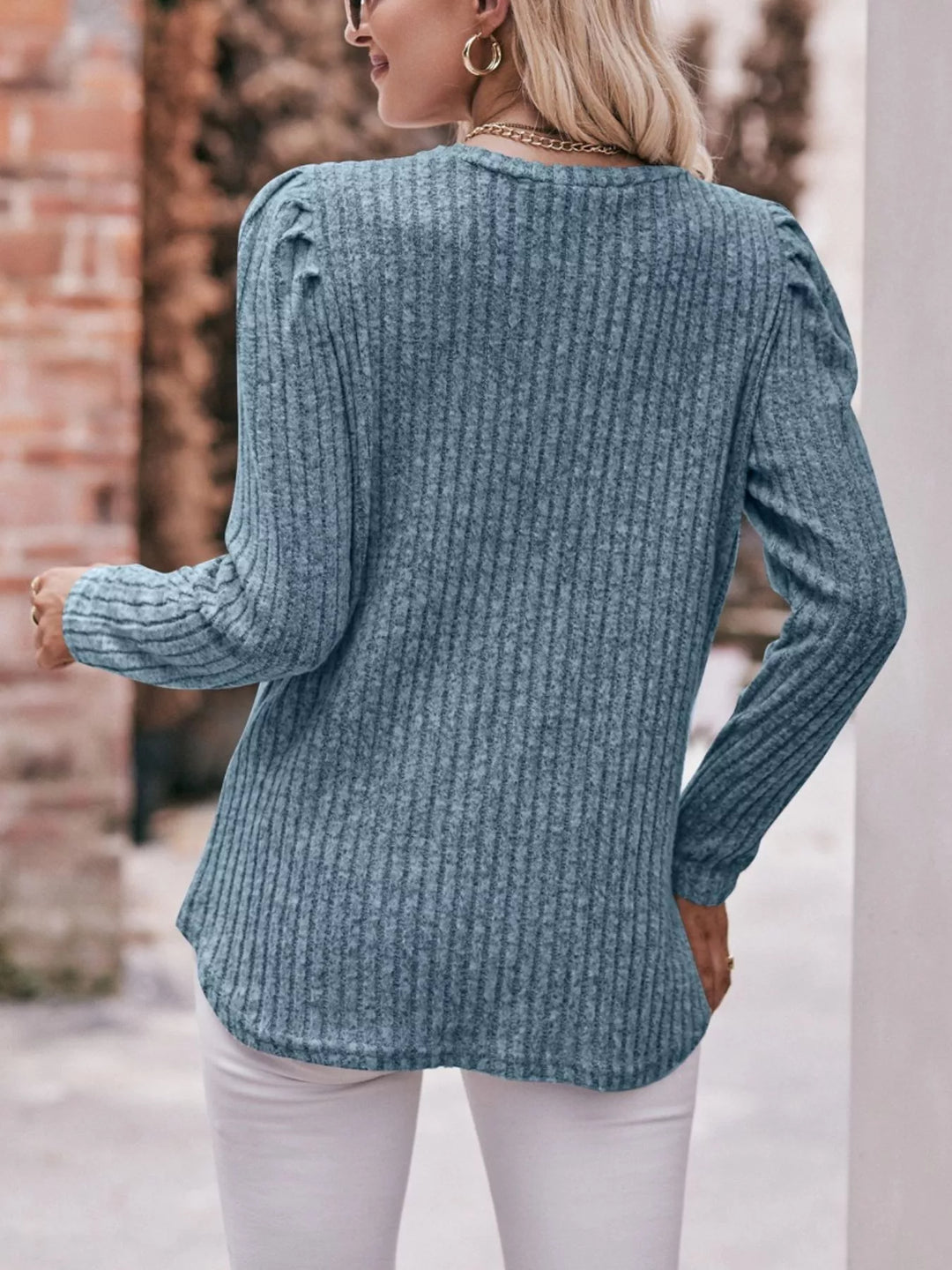 Ribbed knit long sleeve top with puff shoulders