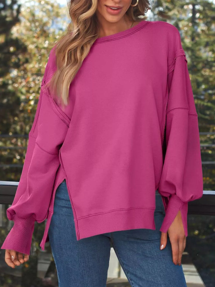 Oversized side-slit sweatshirt with exposed seams