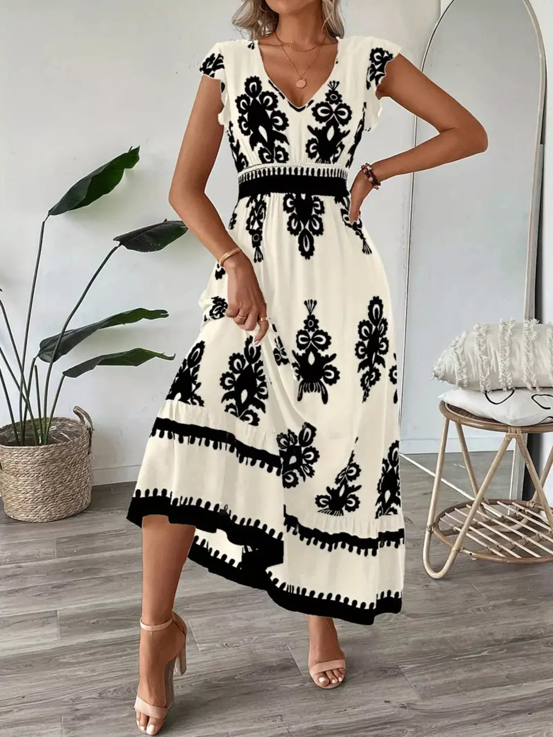 Ornate print v-neck maxi dress with flutter sleeves