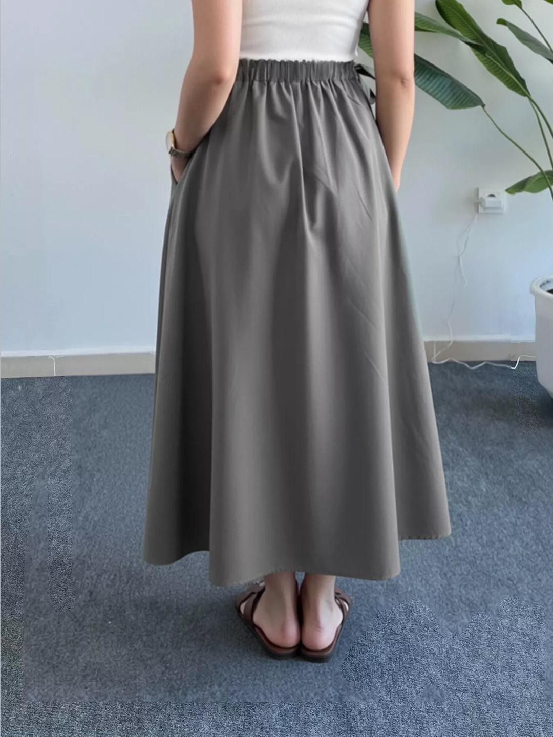 A-line midi skirt with gathered bow-tie waist and pockets