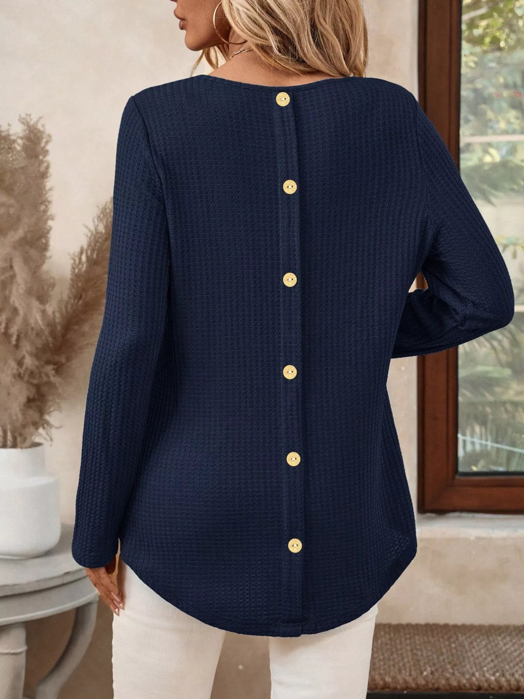 Waffle knit crew neck long sleeve top with curved hem