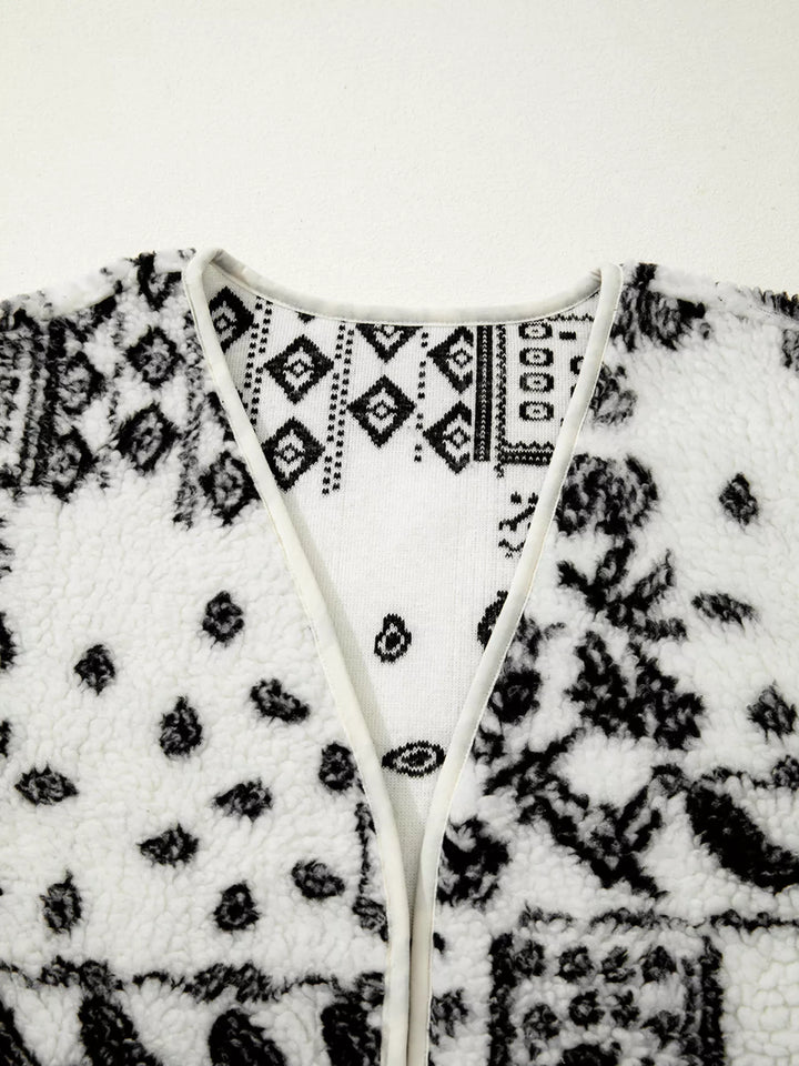Open-front sherpa vest with paisley print and patch pockets