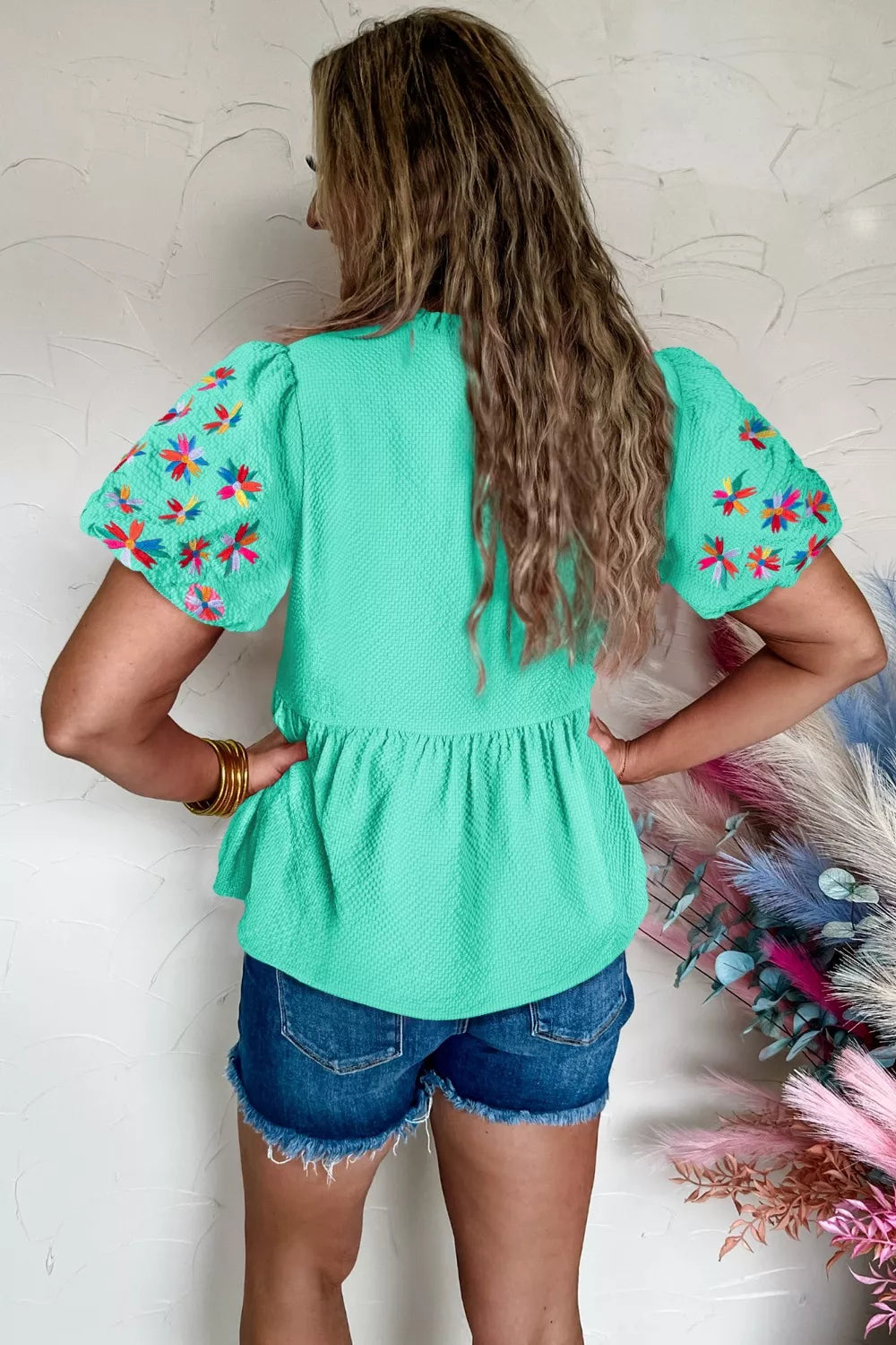 Floral embroidered puff sleeve peplum blouse