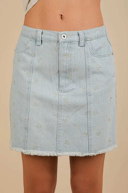Lt Indigo Bow-embroidered denim mini skirt with raw hem