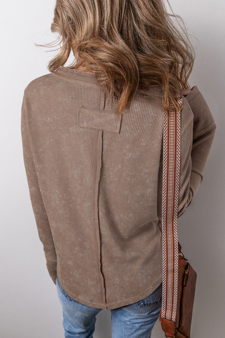 Waffle knit henley top with long sleeves and button placket
