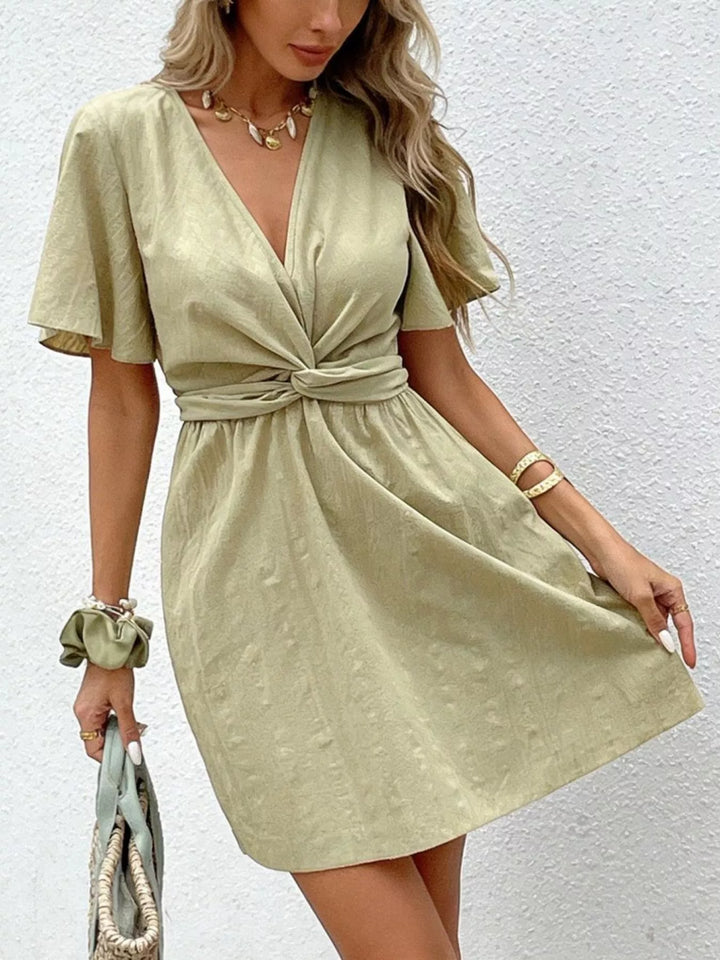 Twist-waist flutter sleeve V-neck mini dress