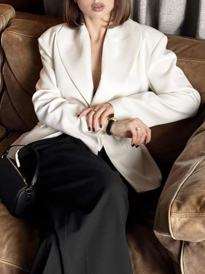 Padded shoulder one-button blazer with notch lapels