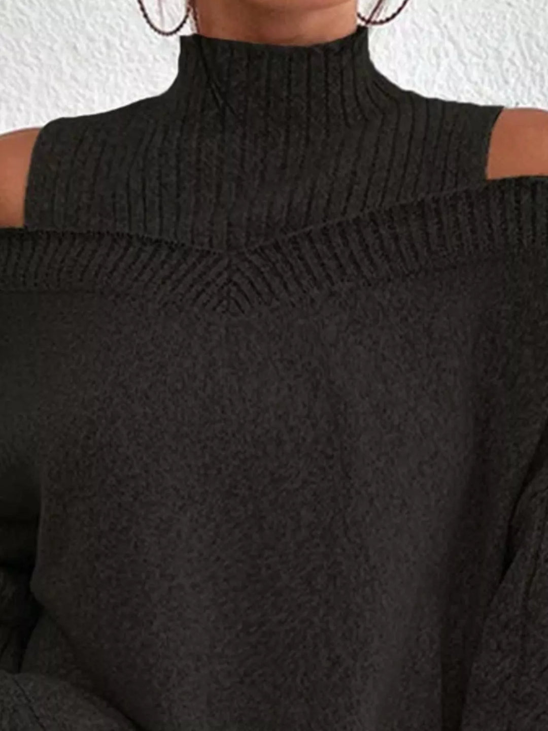 Cold-shoulder cable-knit turtleneck sweater