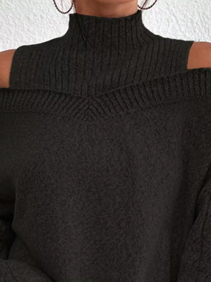 Cold-shoulder cable-knit turtleneck sweater