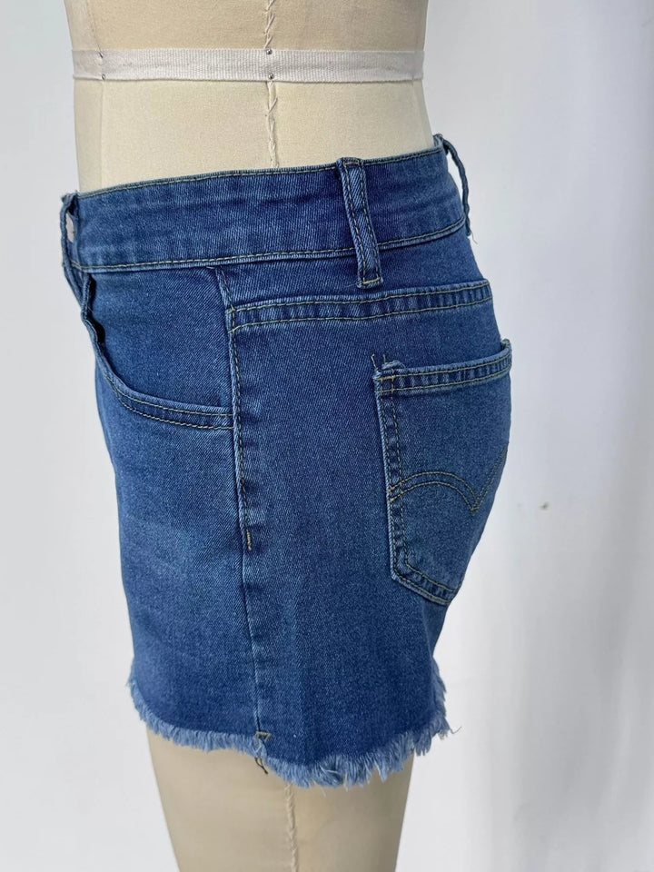 Raw hem denim shorts with frayed edges and five-pocket styling