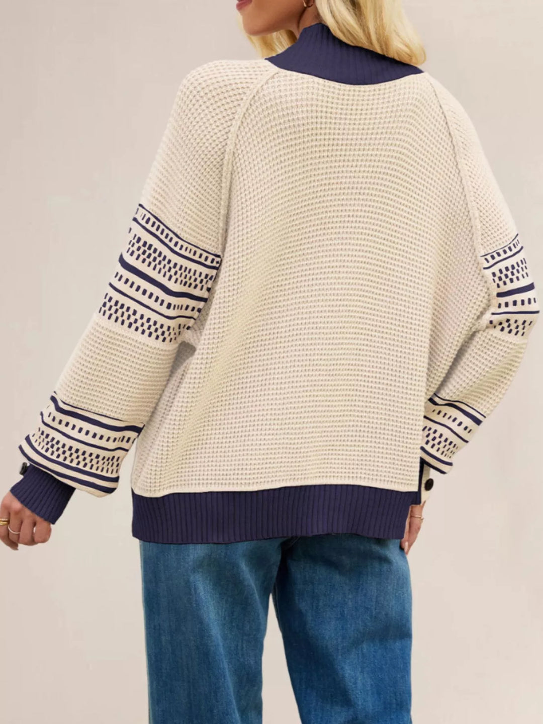 Color-block waffle knit mock neck sweater with button cuffs
