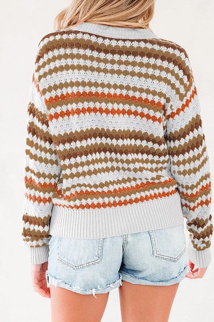 Striped pointelle knit crewneck sweater with drop shoulders