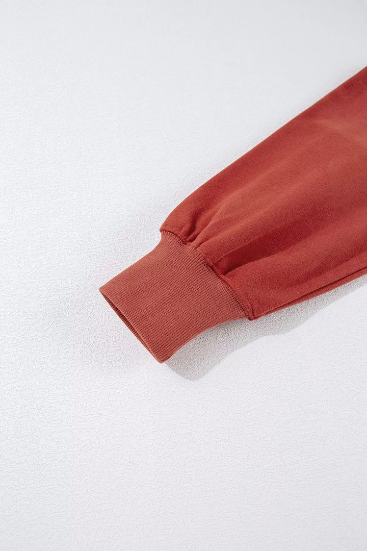 Oversized drawstring hoodie with dropped shoulders and pockets