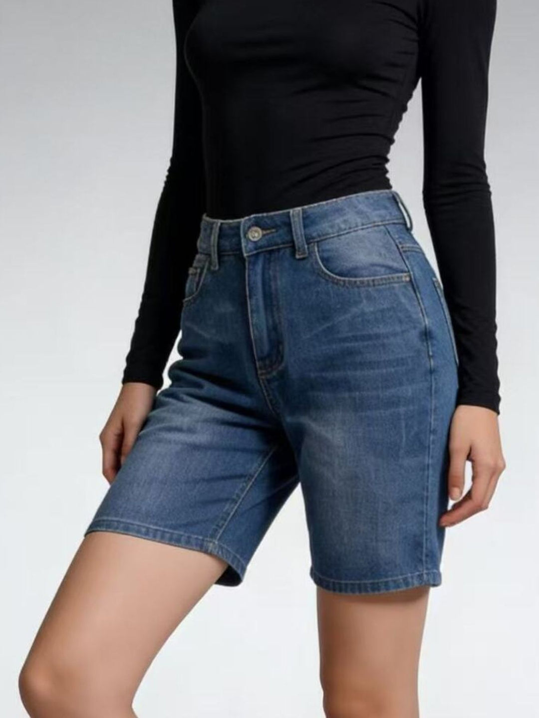 High-rise bermuda denim shorts with whiskered front