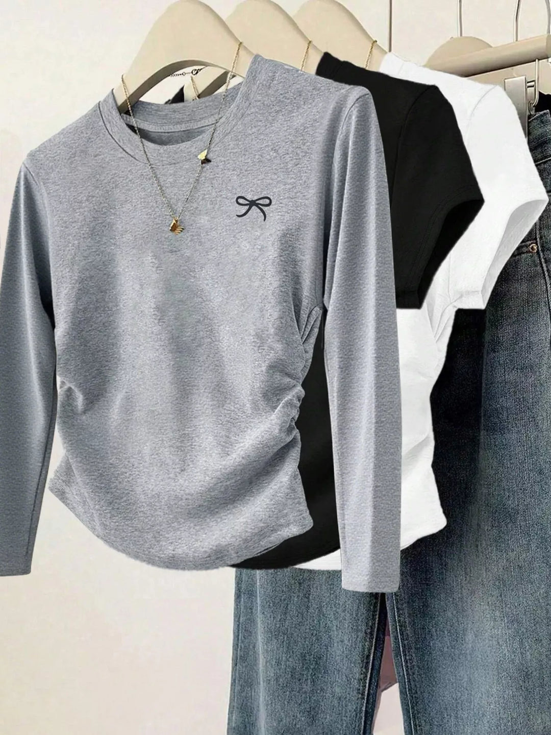 Ruched side long sleeve tee with embroidered bow