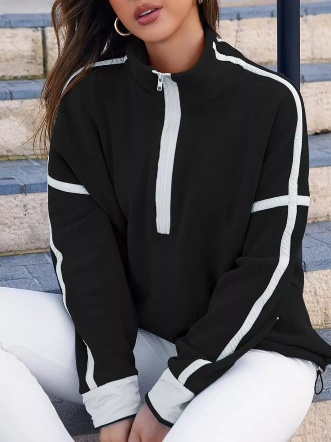 Half-zip fleece pullover with contrast trim and zip pockets