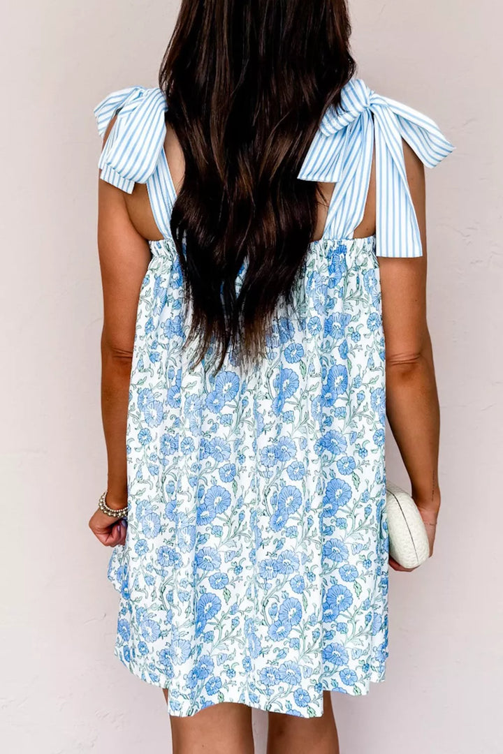Floral babydoll mini dress with striped tie straps