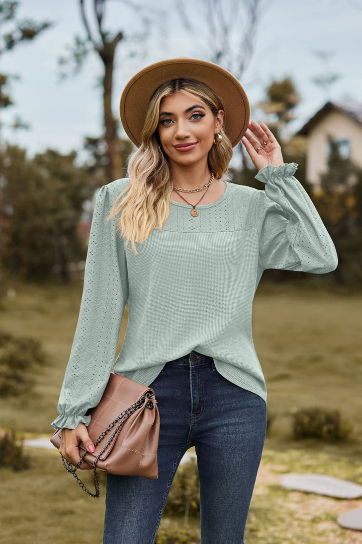 Sage Eyelet knit puff sleeve blouse with round neckline