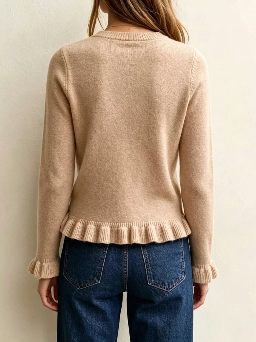 Ruffle hem crew neck knit sweater with ruffled cuffs