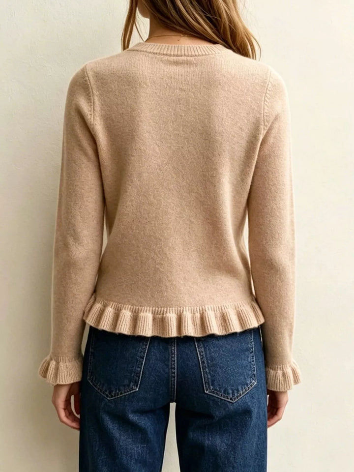 Ruffle hem crew neck knit sweater with ruffled cuffs