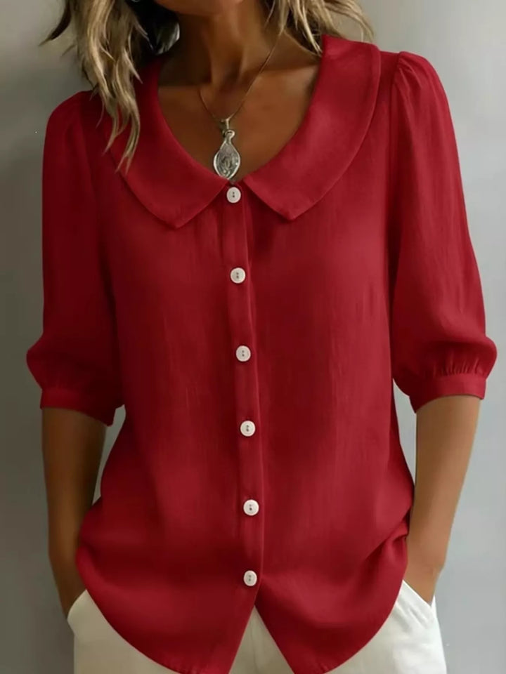 Red Peter Pan collar button-down blouse with 3/4 sleeves