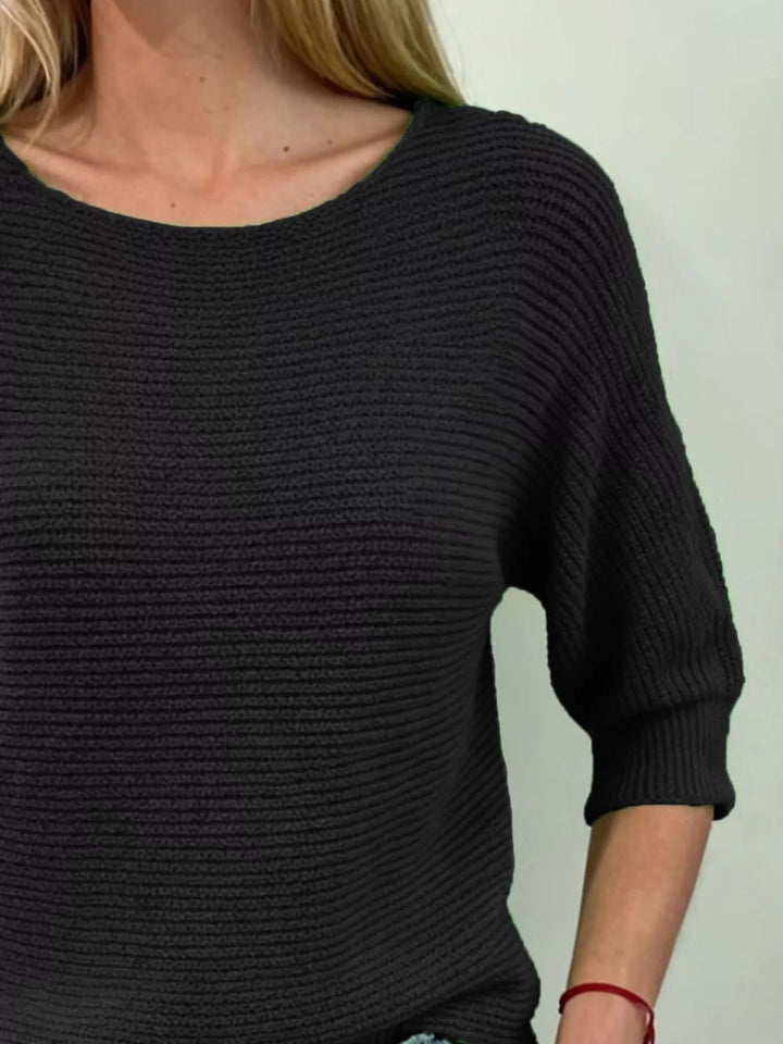 Ribbed knit round neck sweater with dolman sleeves