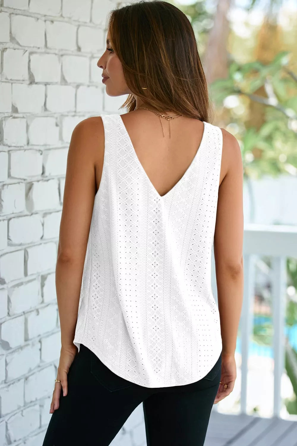 Eyelet knit V-neck tank top with curved hem
