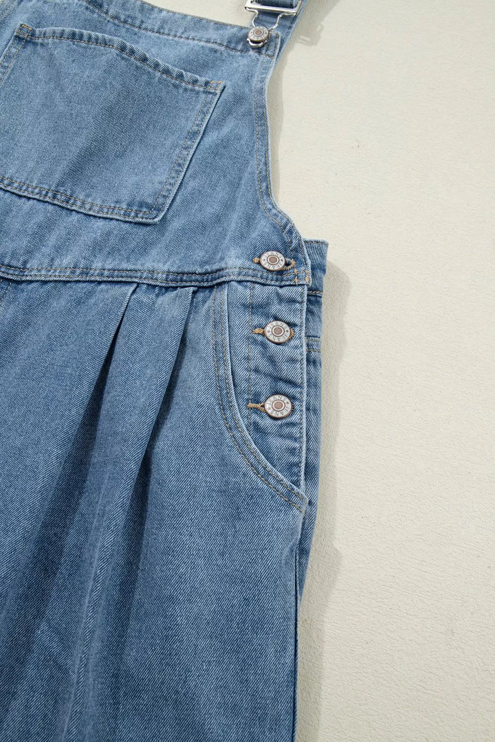 Pleated wide-leg denim overall jumpsuit with bib pocket