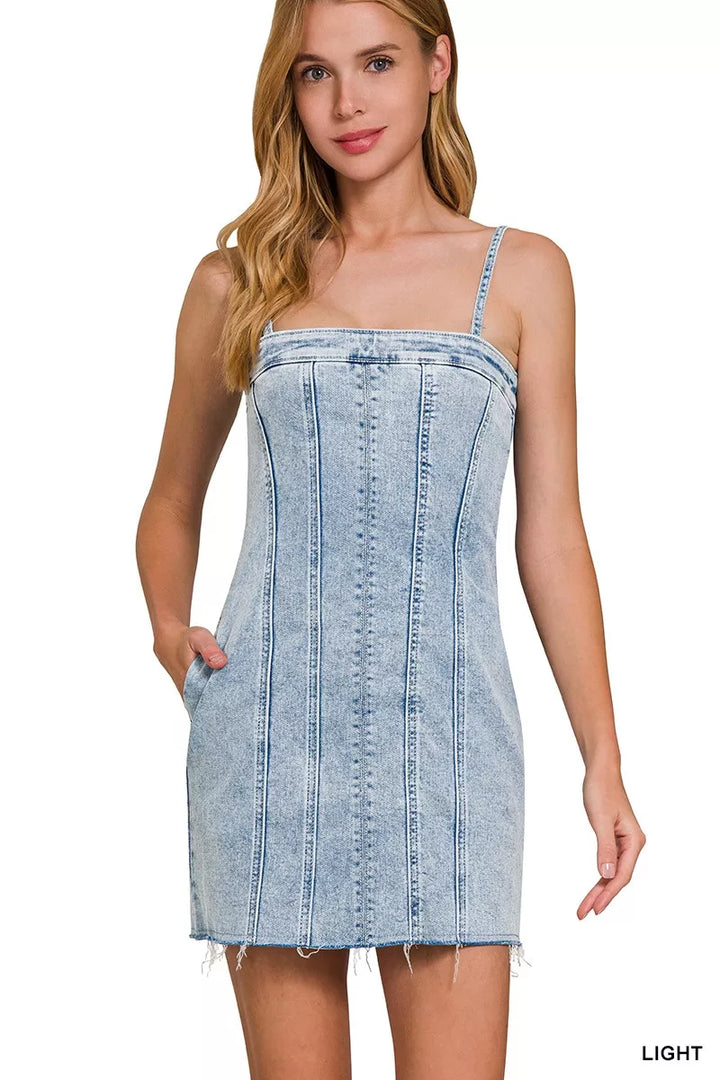 Exposed seam spaghetti strap denim mini dress with raw hem