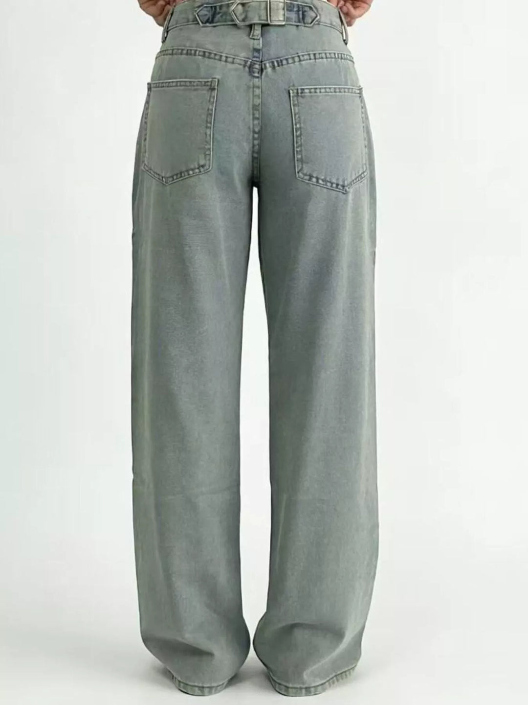 High-rise wide-leg jeans in faded mid-wash denim