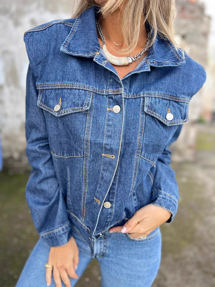 Denim Blue Button-up denim jacket with buttoned chest pockets