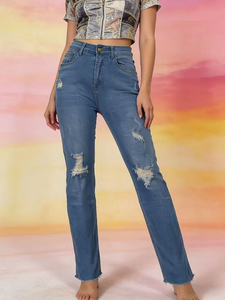 Distressed high-rise skinny jeans with frayed hem