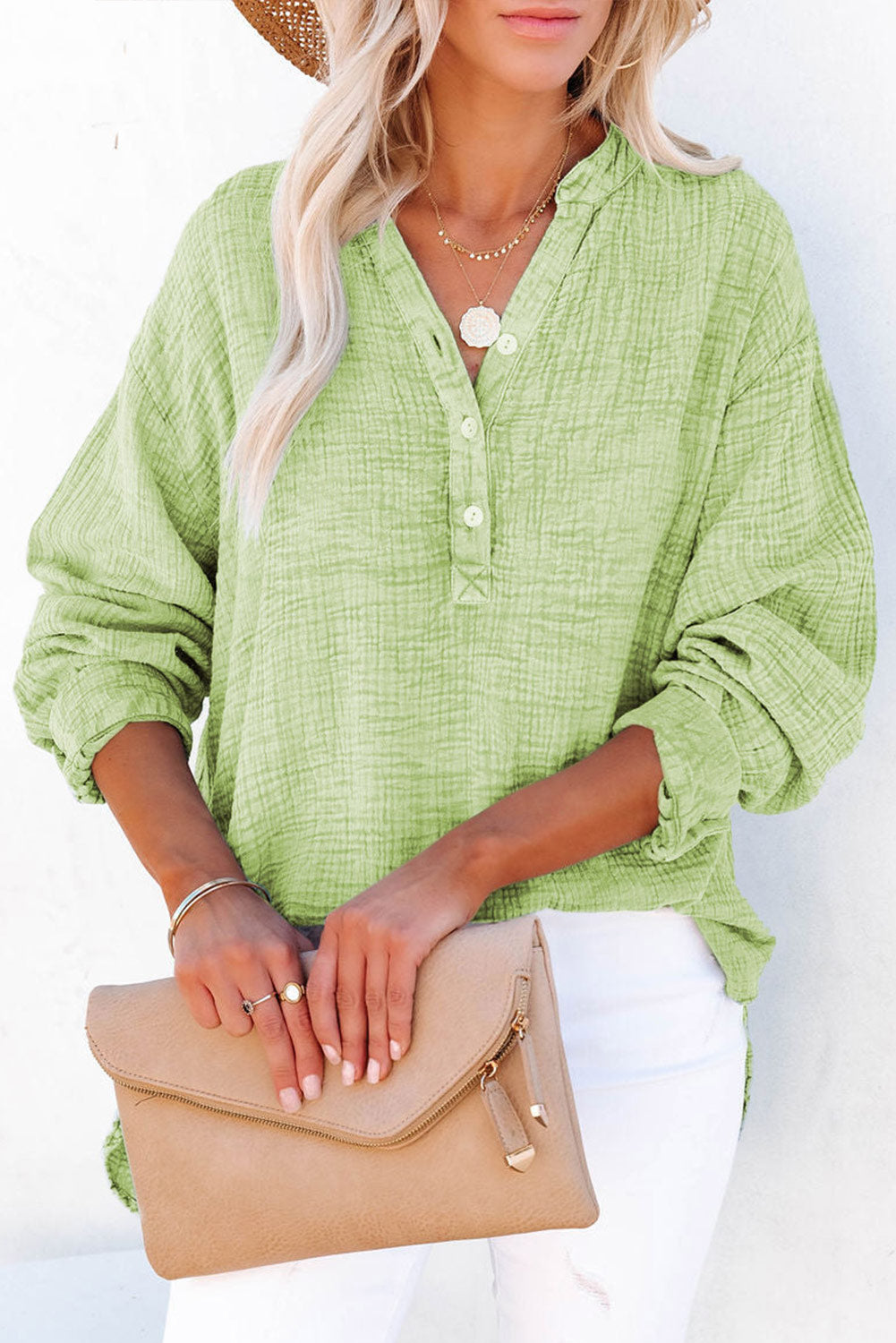 Textured cotton blouse with half-button placket and long sleeves