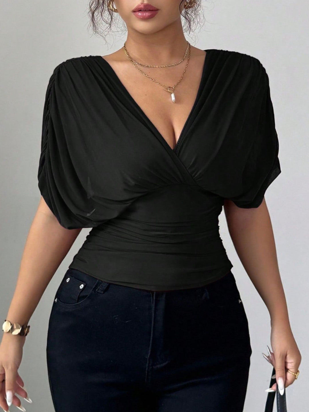 Ruched surplice wrap top with short dolman sleeves