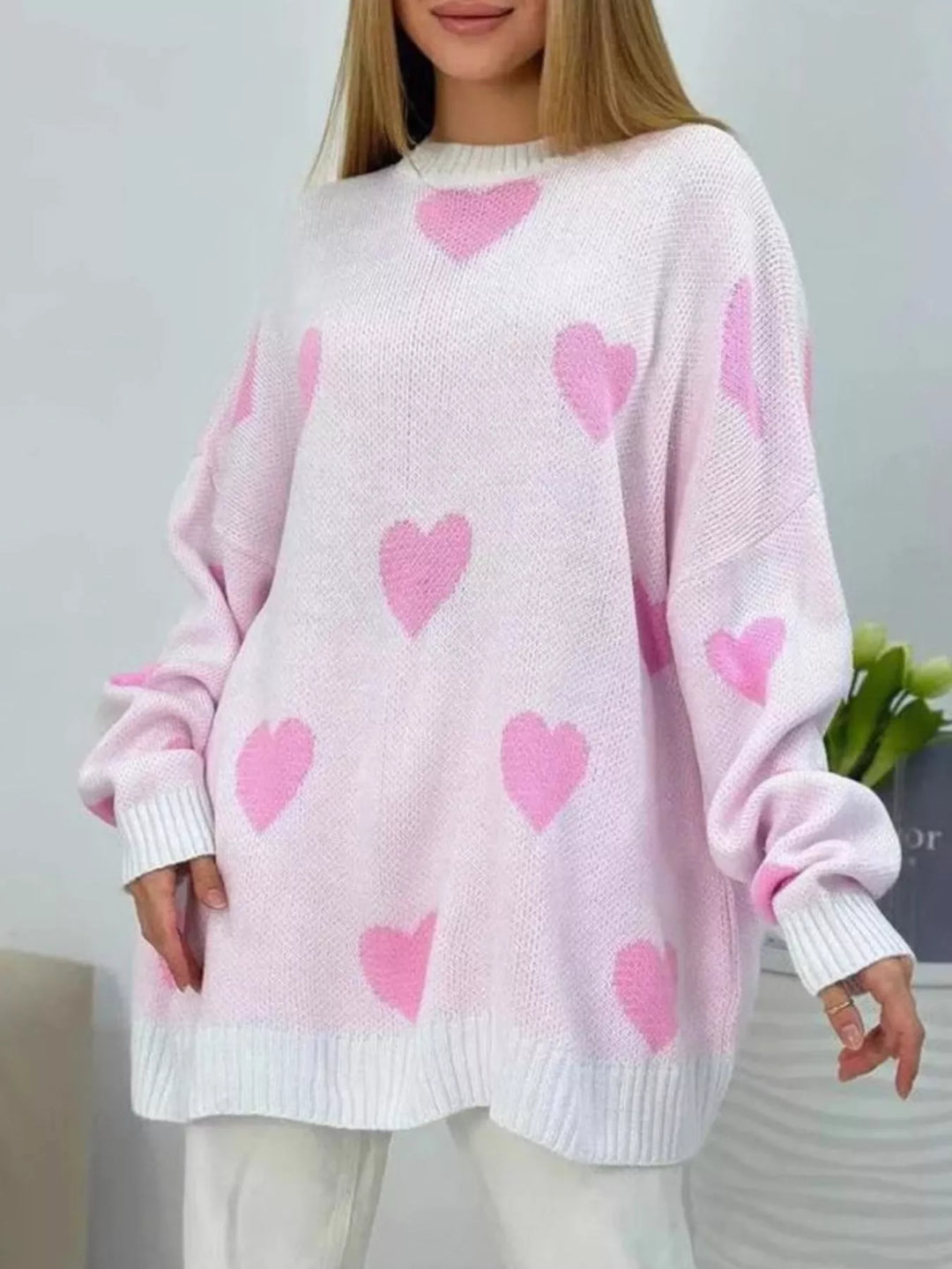 Pink Oversized heart-print knit sweater with drop shoulders